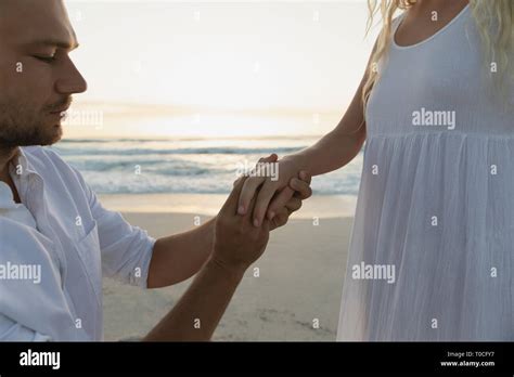 fingering at beach